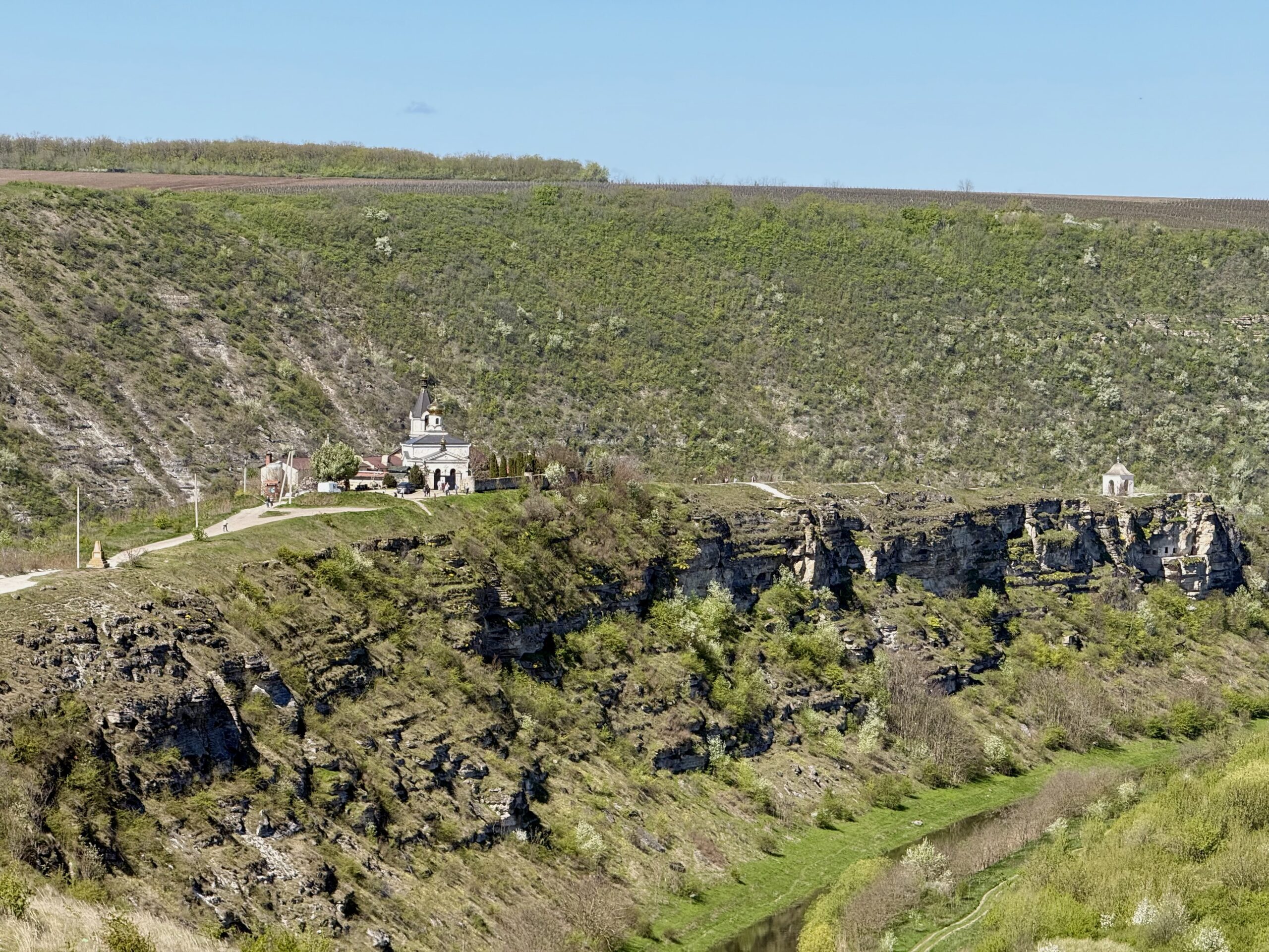 Old Orhei landscape with limestone cliffs and monastery buildings in the Răut River valley